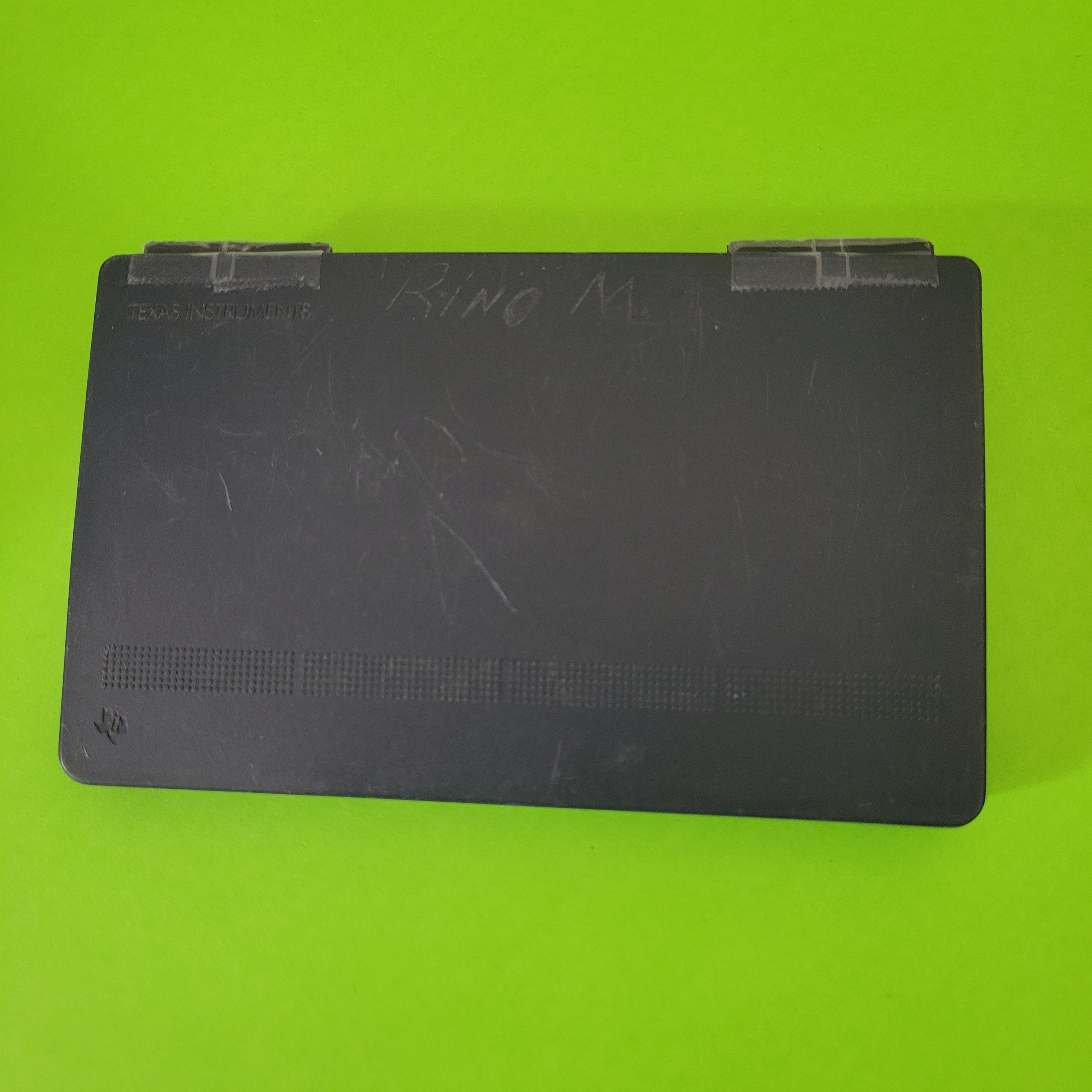 An image of the case of a texas instruments ti37 galaxy solar scientific/engineering calculator